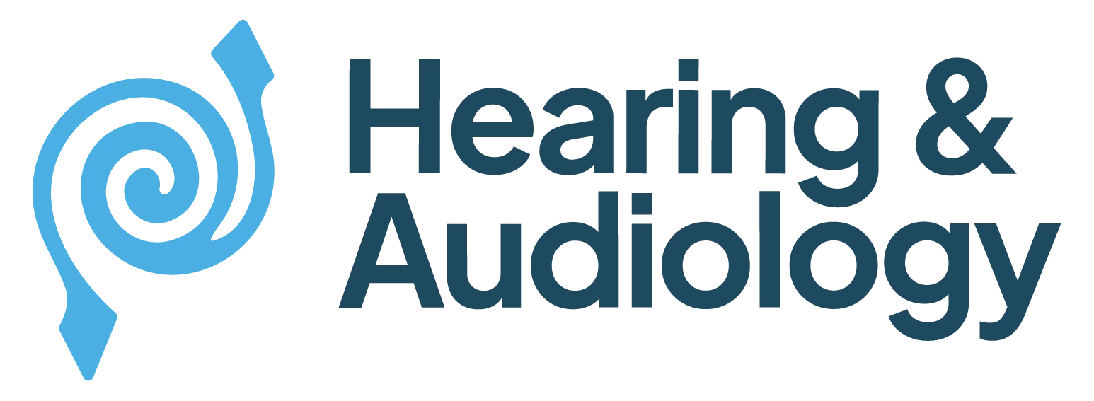 Logo with a blue spiral ear graphic on the left and the words Hearing & Audiology in bold dark blue letters on the right.